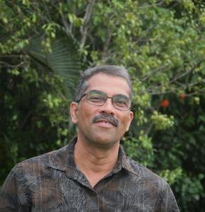 an image of Ajaya Sankara Warrier in front of lush vegetation